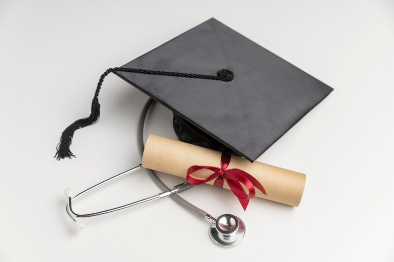 A graduation cap, a stethoscope and a graduation certificate to illustrate Best Public Health Certifications in Africa 2026