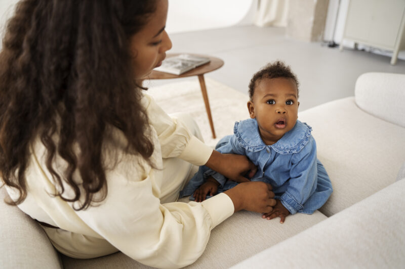 Mother bonding with her baby at home ,supporting postpartum mental health